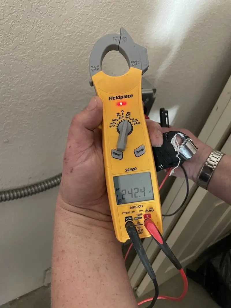 Voltage testing with clamp meter during Circuit Breaker Repair in Walworth